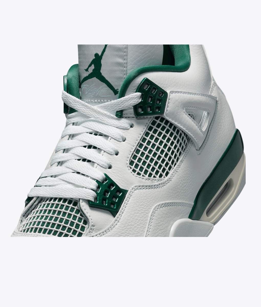 black grey and green jordan 4