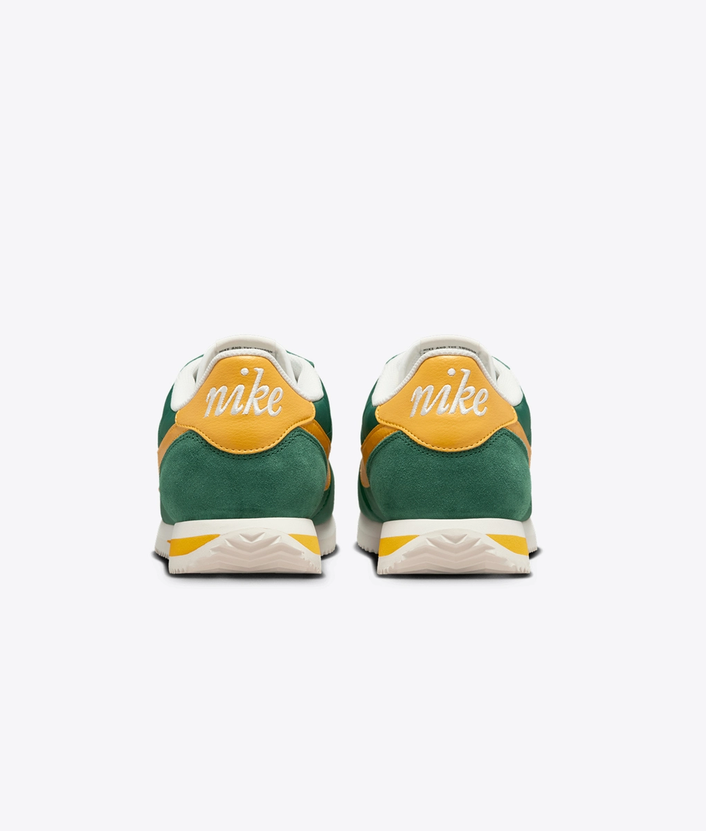 green and yellow nike cortez