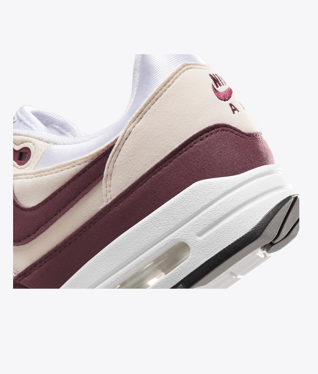 nike white and maroon shoes