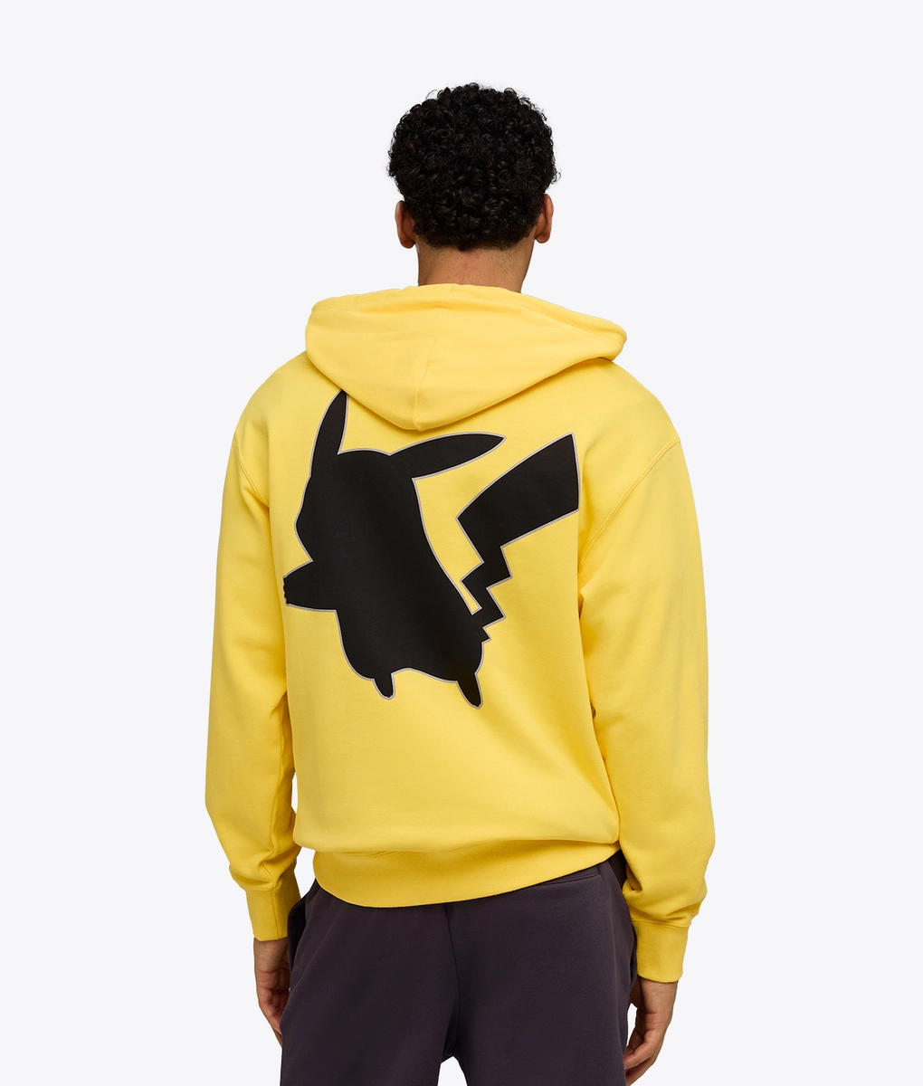 PUMA X POKEMON フーディー ENERGIZING YELLOW Puma - X POKEMON RELAXED GRAPHIC HOODIE - VegNonVeg