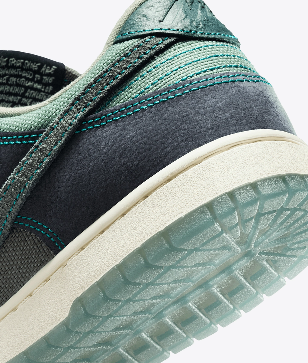black and teal old nike shoes
