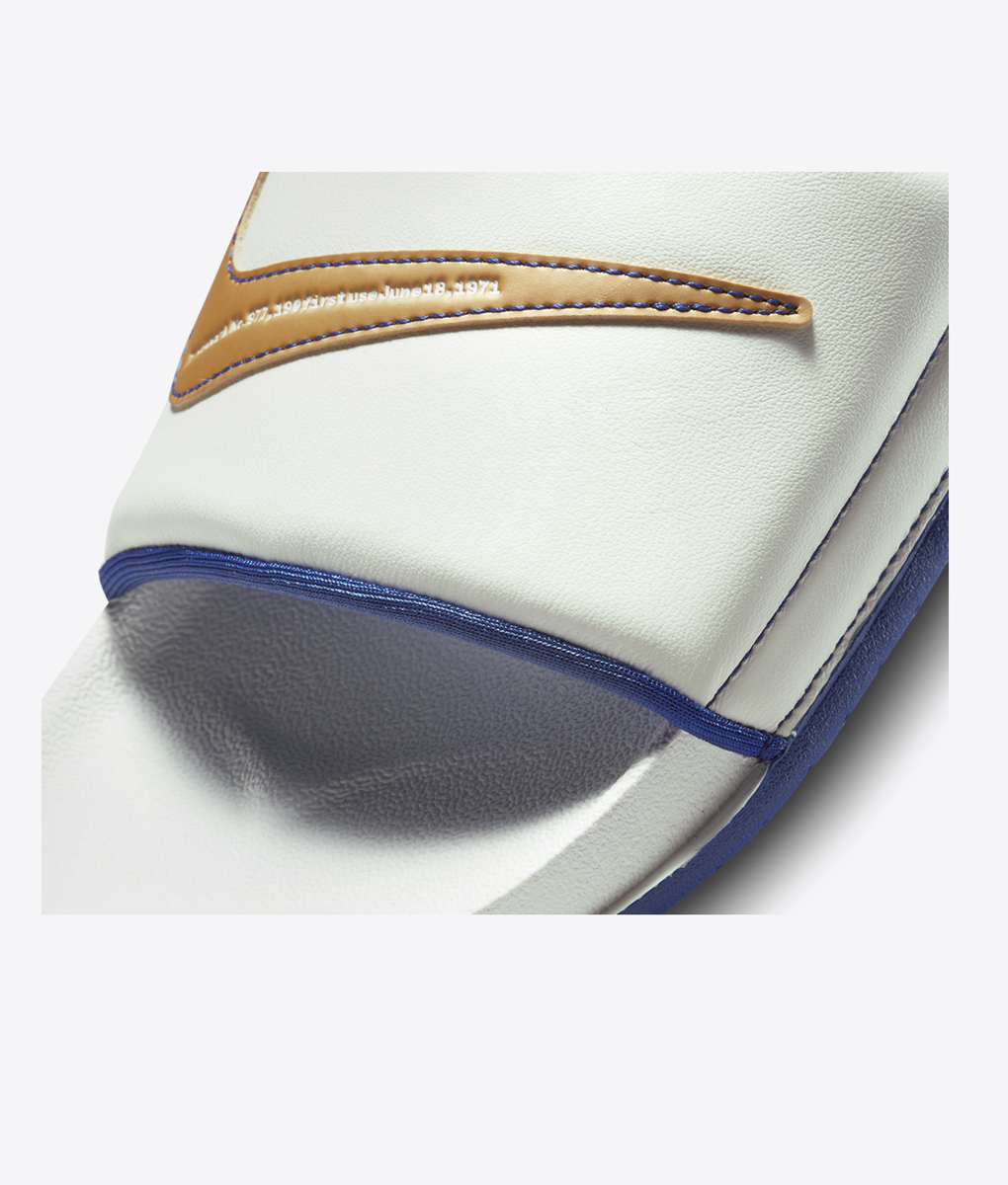 royal blue and gold nike slides