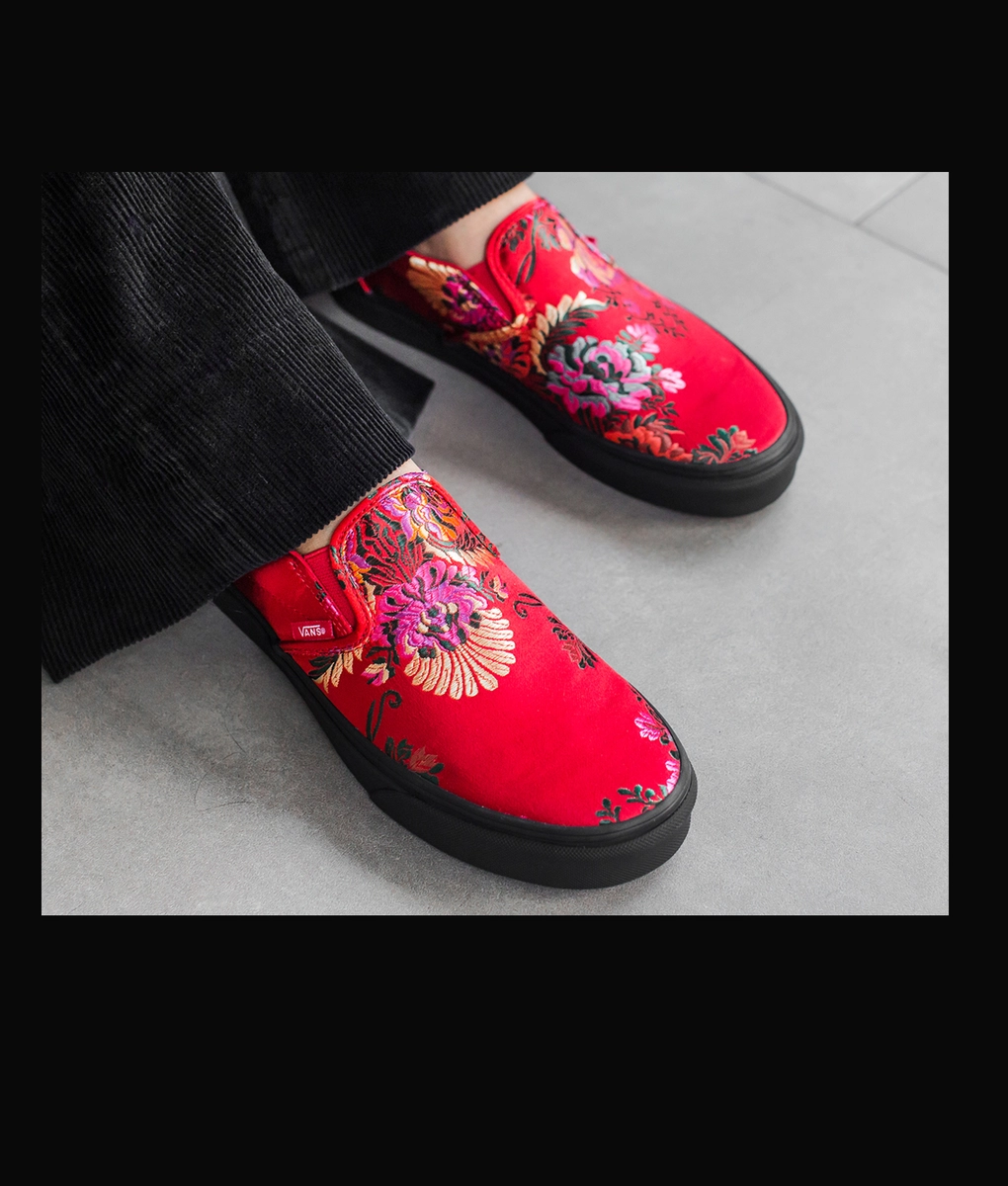 red black vans slip on