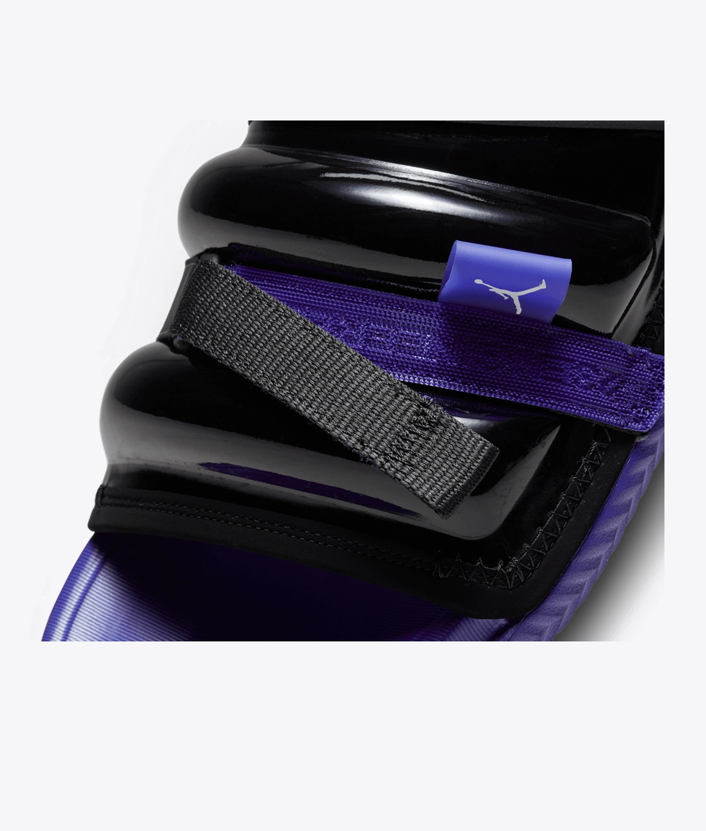 purple and black jordan slides