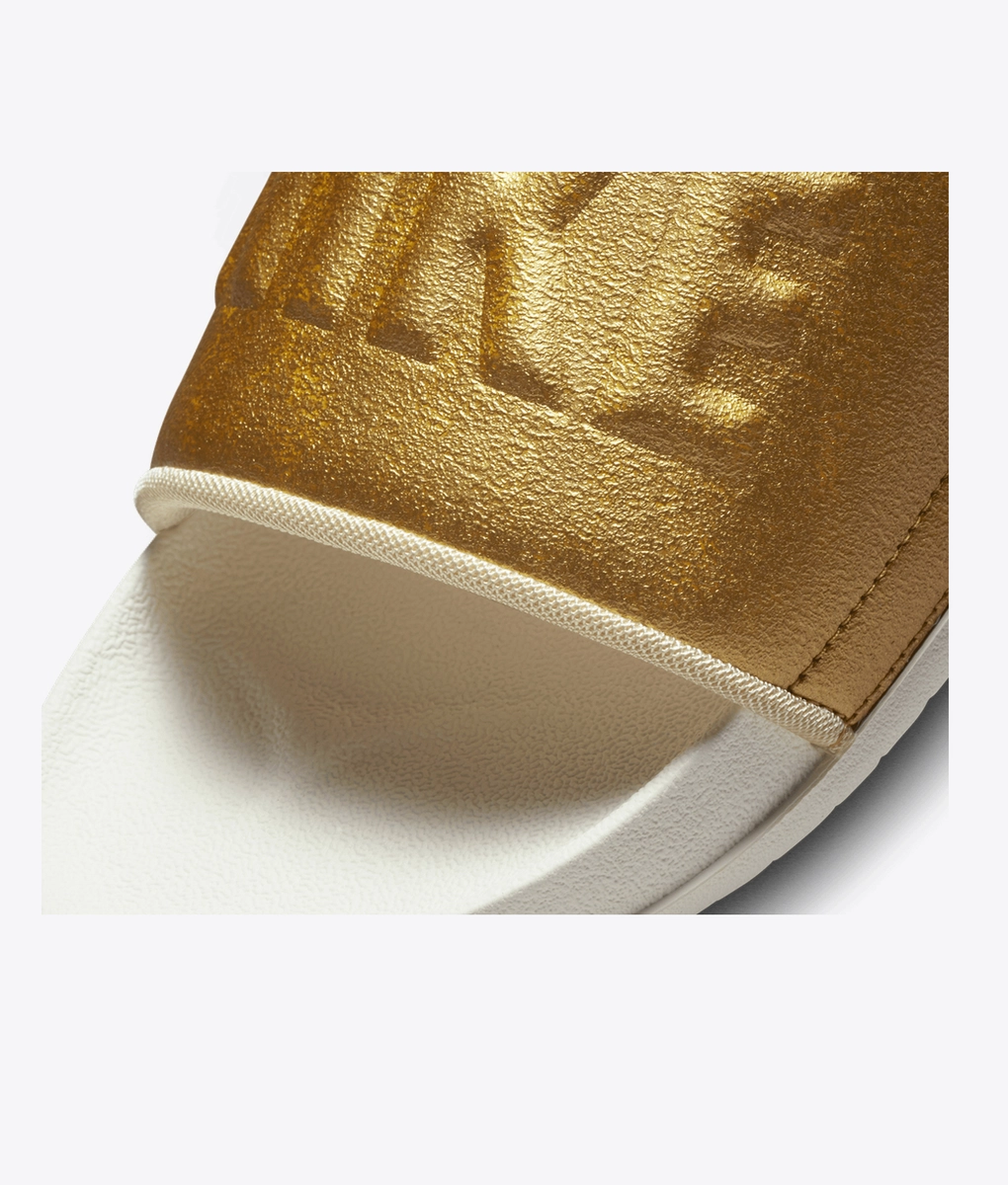 slides gold nike