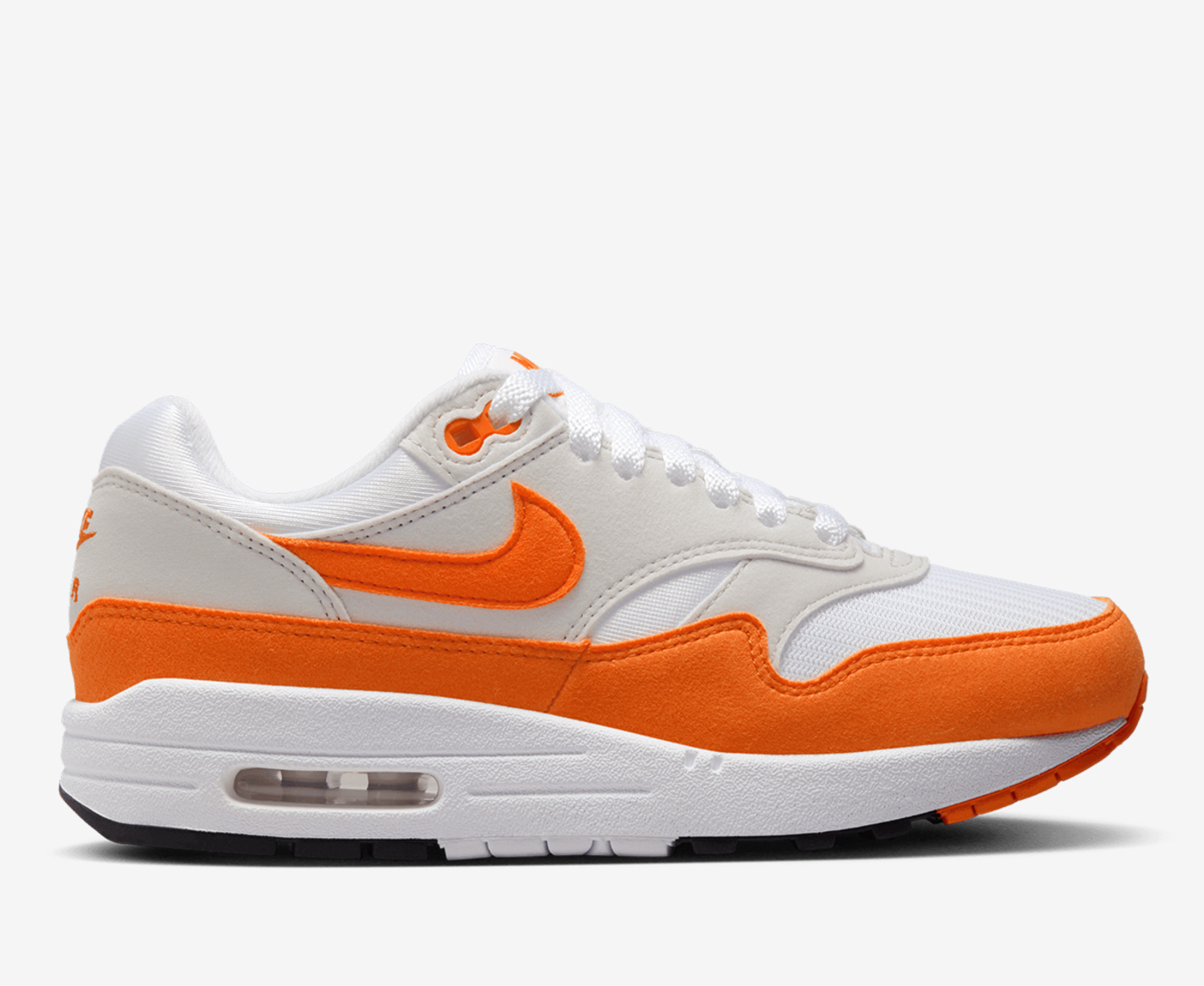 White and store orange nike sneakers