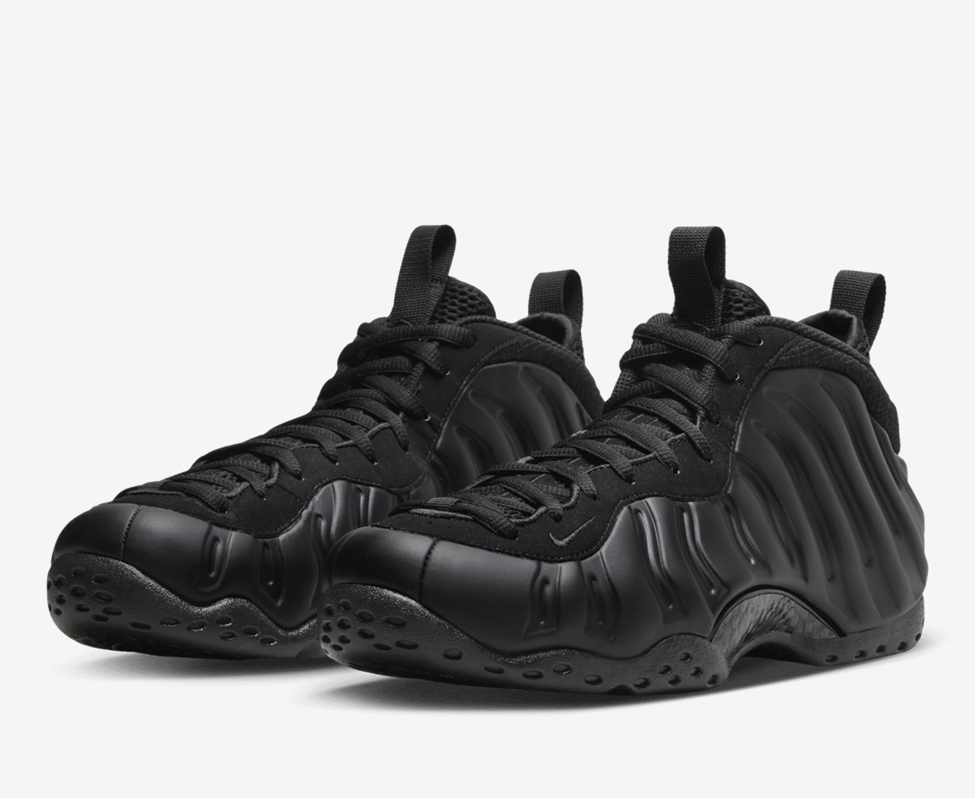 Triple black hotsell foamposites on feet