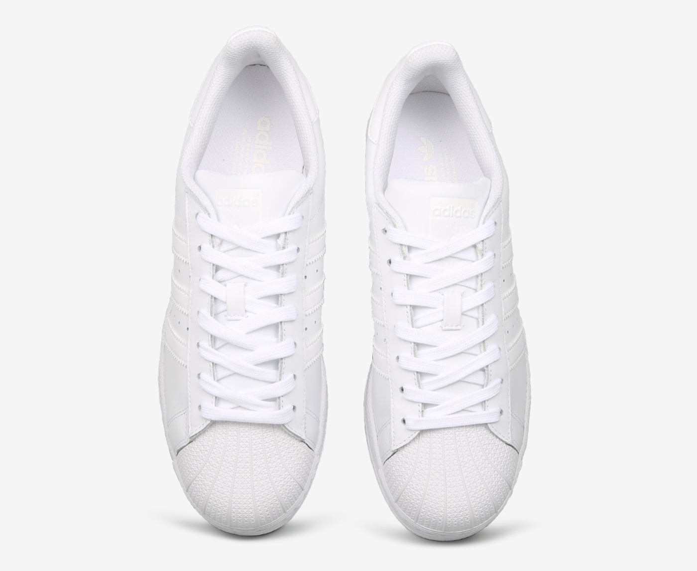 adidas Originals Superstar trainers in triple white