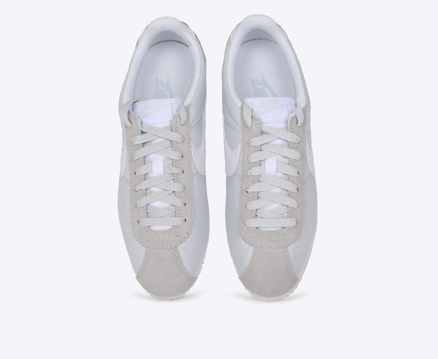 Nike cortez platinum on sale white