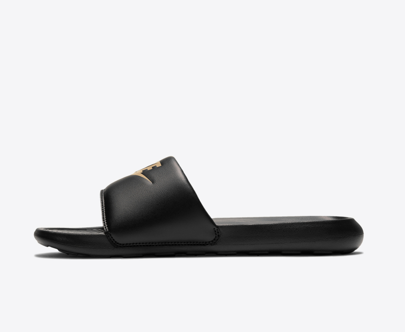 Nike gold discount and black slides