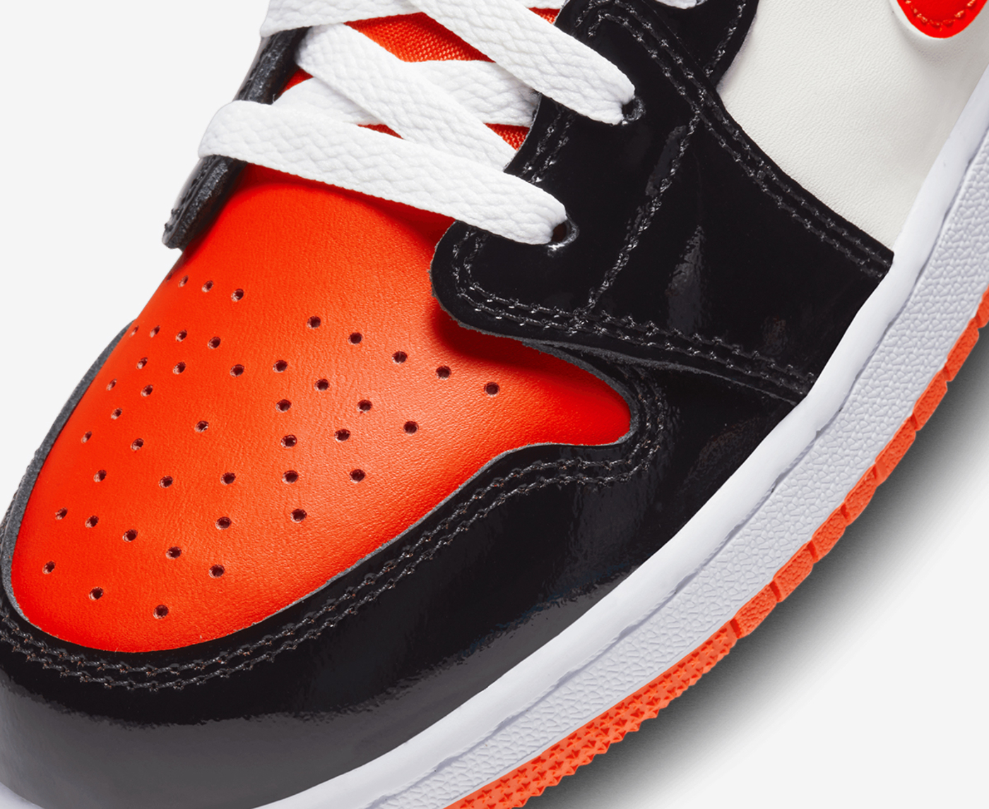 Orange jordan best sale 1 low