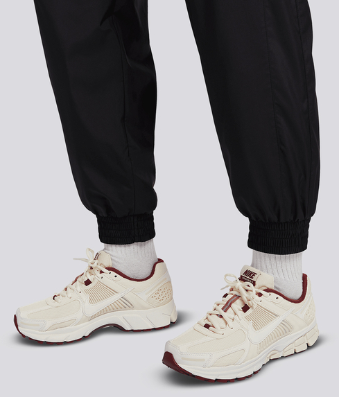 Nike SPORTSWEAR UV ESSENTIAL WOVEN JOGGER BLACK WHITE VegNonVeg