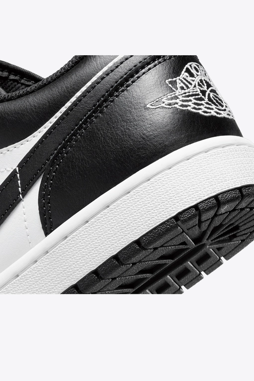 black and white low top jordans