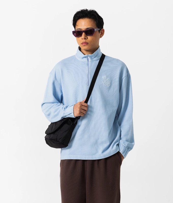 ESSENTIALS QUARTER ZIP SWEATSHIRT