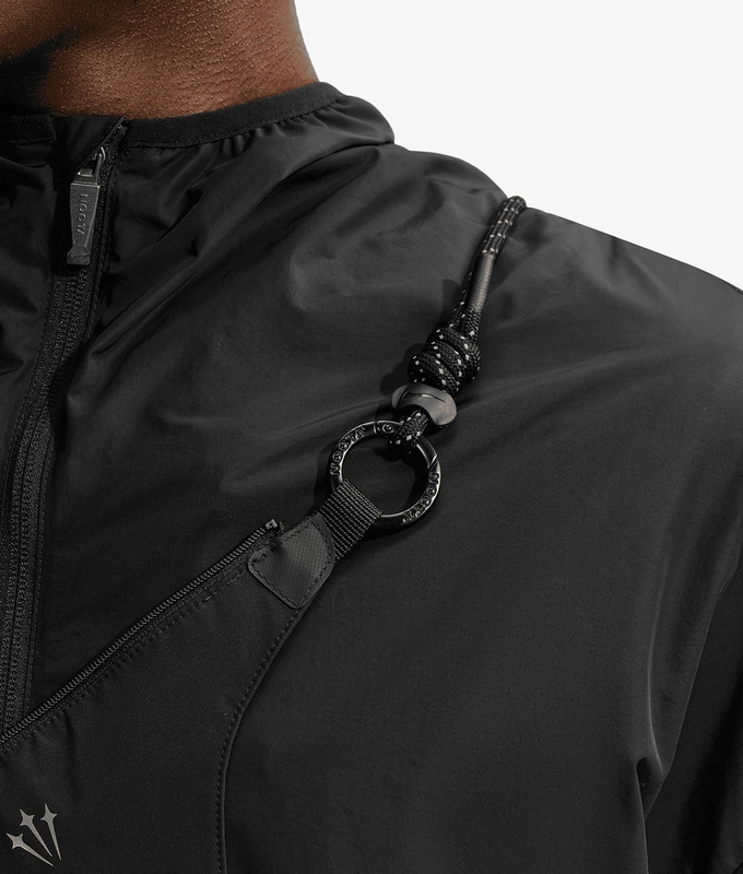 X NOCTA SHROUD CUT TRACK JACKET