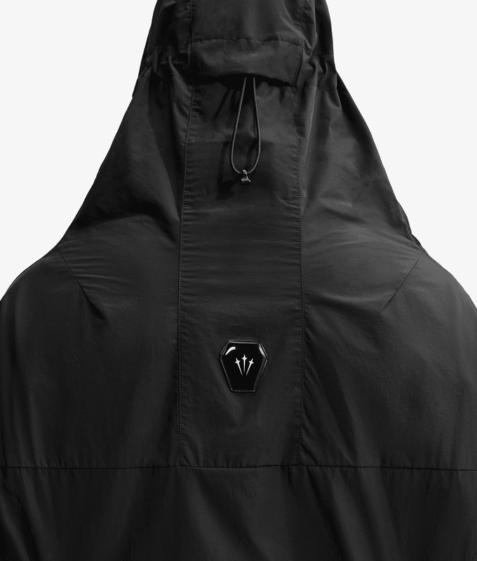 X NOCTA SHROUD CUT TRACK JACKET