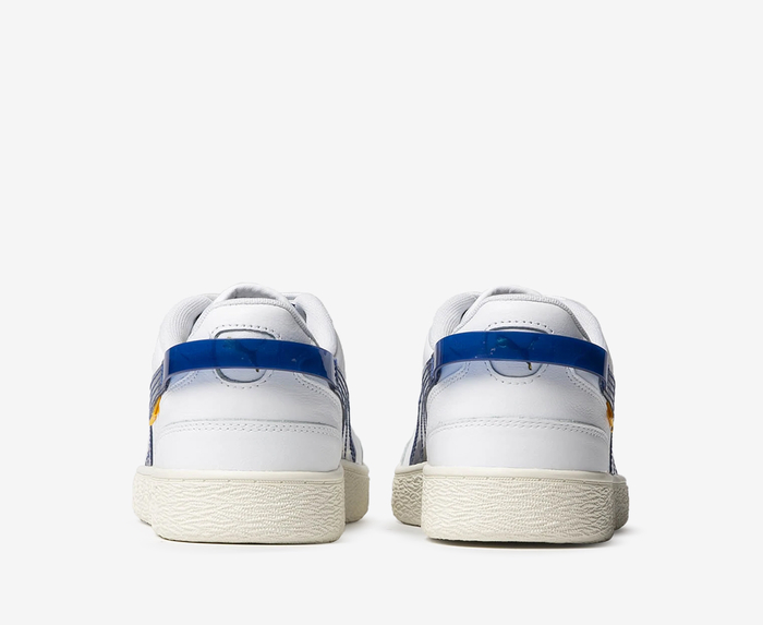 Puma white best sale with blue stripe