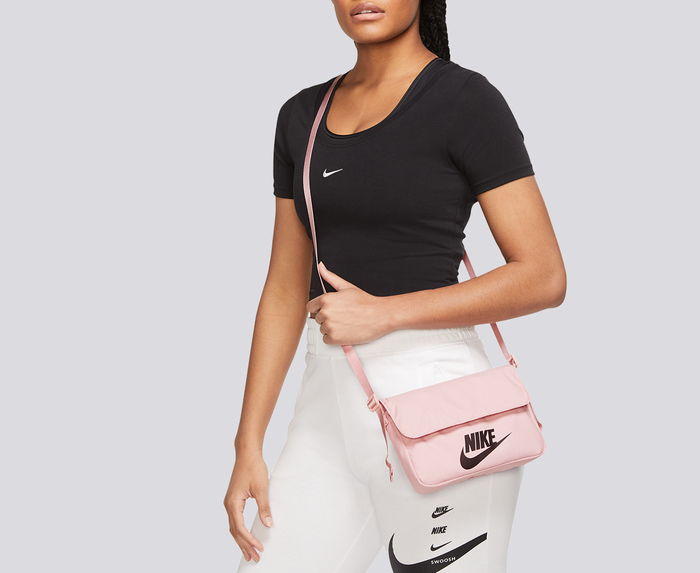 Elevate your game with the W NSW Futura 365 Crossbody Bag, the perfect  blend of fashion-forward design and functionality. Crafted with…