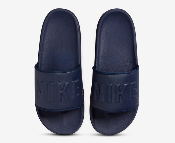 Nike offcourt slides with best sale embossed branding