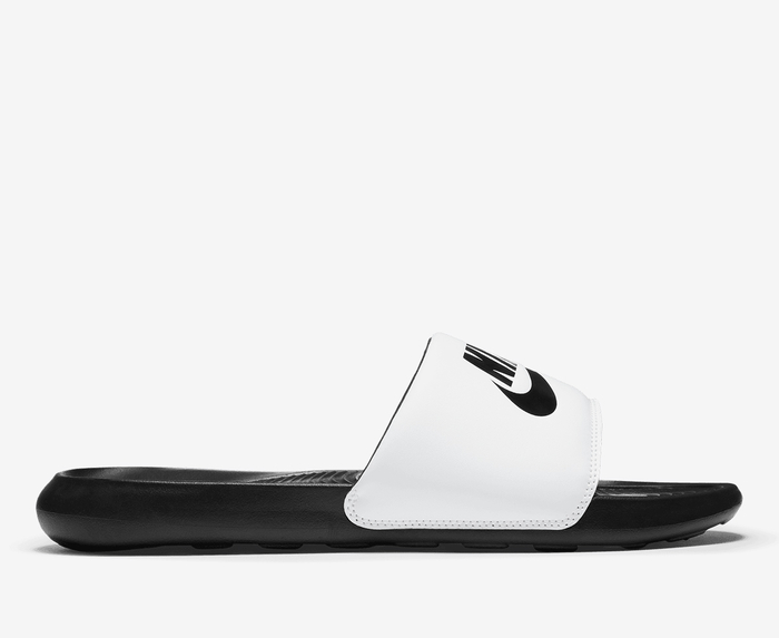 Black nike slides discount with white swoosh