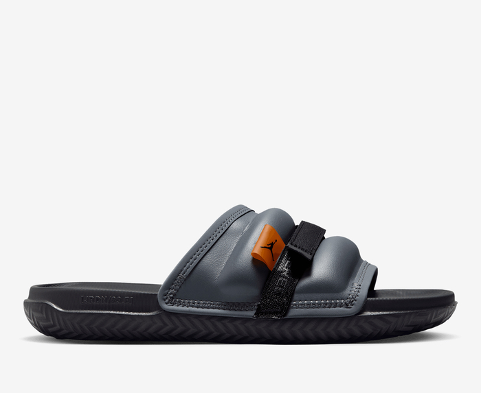 Jordan slides black online and gold