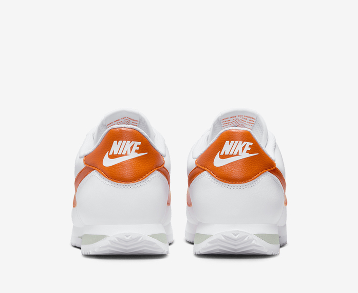 White and orange nike sales sneakers