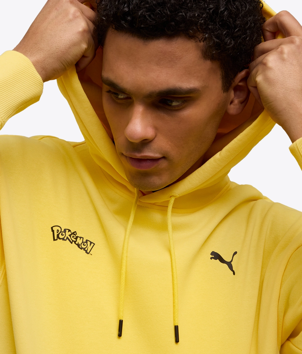 PUMA X POKEMON フーディー ENERGIZING YELLOW Puma - X POKEMON RELAXED GRAPHIC HOODIE - VegNonVeg